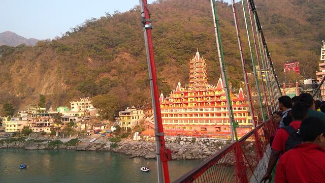 Ghats and temple tower beside Laxman Jhula, Rishikesh
